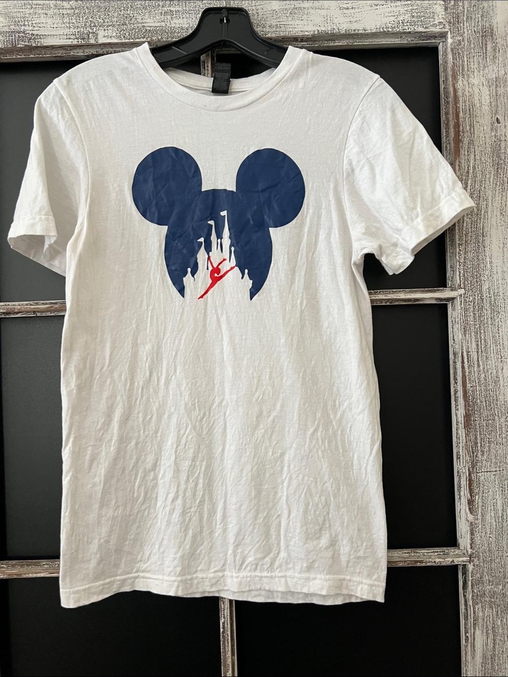 White Graphic Tee with Navy Mickey Silhouette and Red gymnast accent.